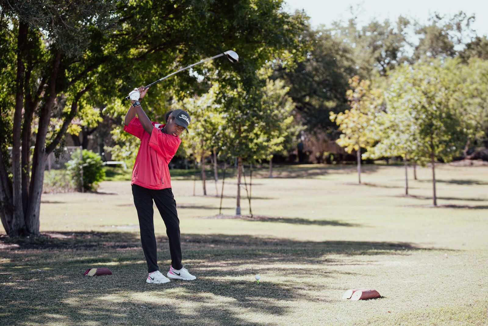 Junior golfer at the tee